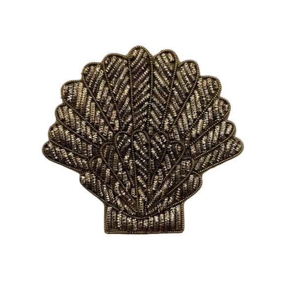 Broche coquillage doré