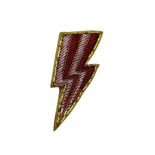 Broche éclair rouge