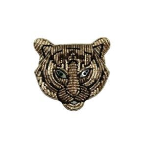 Broche tête de tigre dorée brodée